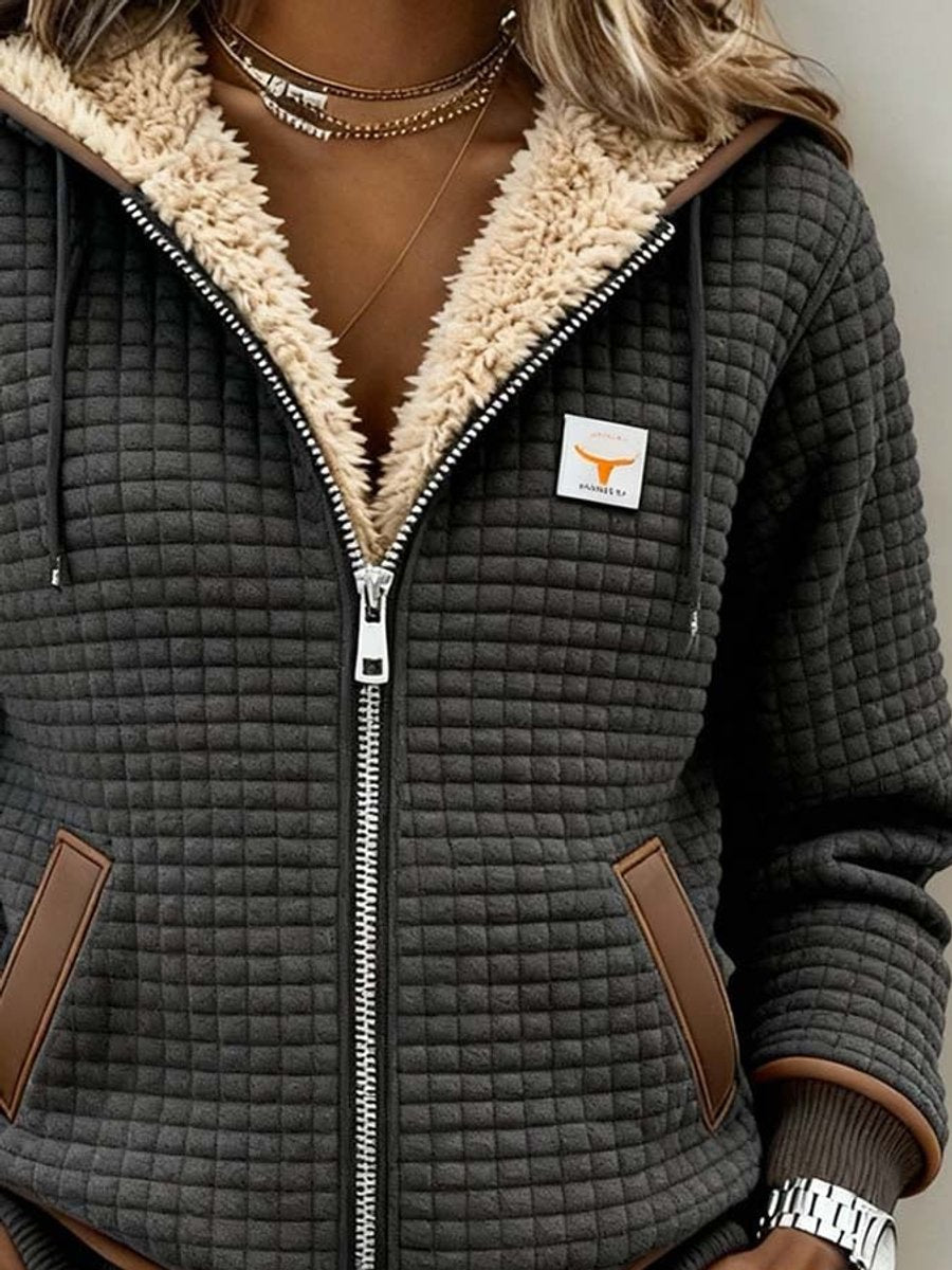 Sancha | Sherpa-fôret quiltet zip-up hettejakke